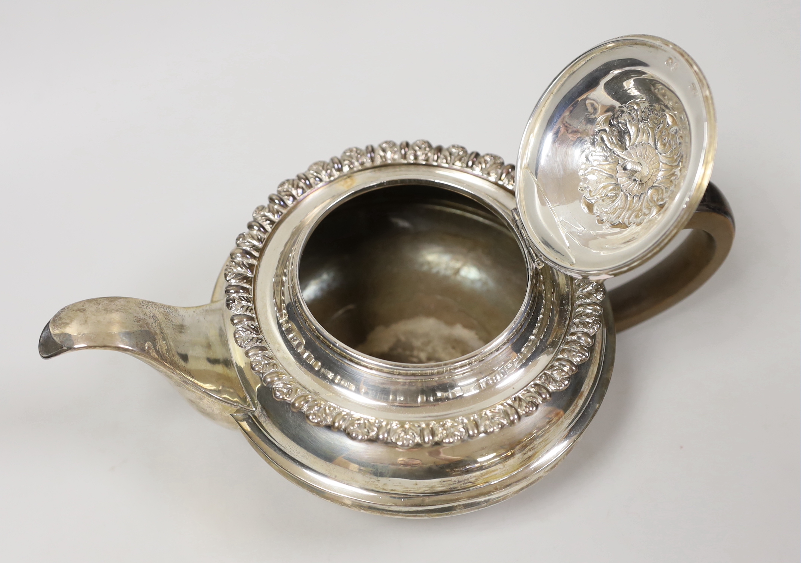 A George III silver squat circular teapot, George Burrows II, London, 1816, gross weight 20.6oz.